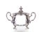 Silver sugar bowl on white background