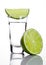 Silver tequila shot glass with lime slice and salt