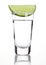 Silver tequila shot glass with lime slice and salt