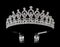 Silver tiara diadem with gems and diamonds isolated on black background