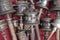 Silver Tibetan prayer wheels on stall at Swayambhu