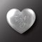 Silver Valentine`s day heart on black background