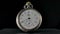 Silver vintage pocket watch with running hands in timelapse video. Old pocket watch with round dial and ticking hands