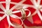 Silver wedding rings on red and white ribbons and rhinestones