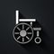 Silver Wheelchair for disabled person icon isolated on black background. Long shadow style. Vector