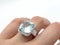 Silver women`s vintage design ring with diamonds and gem