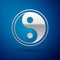 Silver Yin Yang symbol of harmony and balance icon isolated on blue background. Vector Illustration