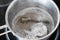 Silverware in boiling solution of baking soda