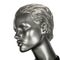 Silvery plastic head of a beautiful female mannequins isolated