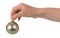 Silvery small toy-ball is held by female hand