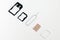 Sim card,sim card adapter, sim card eject tool for changing or removing, digital media put on white background