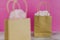 Similar or alternative products, shopping bags side by side with similar paper color