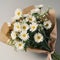 Simple bouquet with daisies and greenery. Mother\\\'s Day Flowers Design concept