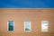 Simple brick facade with two vertical windows