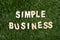 Simple Business Wooden Sign On Grass