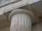 Simple capital on a fluted marble column