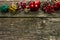 Simple Christmas decorations on aged weathered pine wood boards