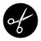 Simple, circular black and white scissors white silhouette icon.