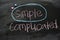 Simple or Complicated written with color chalk concept on the blackboard