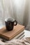 Simple composition of indoor relaxation with coffee and books