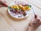 A simple country lunch with herring and caviar on the plate.