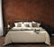 Simple and cozy bedroom interior, old grunge brown wall, bed with linen blanket