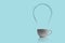 simple cup with a light bulb shape steam, a fresh hot energy coffee drink concept