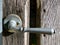 simple door handle on wooden garden gate