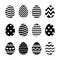 Simple Easter black eggs icon with diferent texture isolated on white background