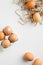 Simple Easter eggs on white background. Happy Easter vertical banner mockup. Flat lay, top view. Nordic style