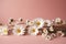 Simple elegance white daisies on pale pink, minimal flat lay