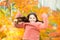 Simple happiness. Kid enjoy autumn outdoors. Meet autumn. Little girl smiling happy cute child gorgeous long hair maple