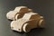 Simple home made wooden toy cars on black background. Selective focu