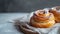 Simple yet inviting image of cinnamon buns, promising a cozy indulgence