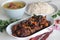 Simple Kerala style chicken meals with parboiled rice and lentil curry. Chicken is prepared with 5 ingredients