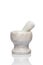 A simple kitchen mortar and pestle for grind ingredients. Set of tools for preparing substances by crushing and grinding them into