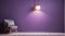 Simple lamp hangs on purple wall and illuminates it, space for t