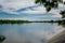 A simple landscape in the Rostov region in Russia, the river - Seversky Donets, Don. Spring is the beginning of summer. Green vege