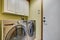 Simple laundry room with washer dryer set.