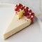 Simple mascarpone cheesecake with winter berry forest fruits, serving slices on a white plate.