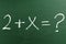 Simple math equation on the green chalkboard in elementary School