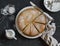 Simple orange cake with olive oil on a dark stone background.