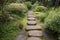 a simple pathway through a garden, dotted with stepping stones