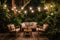 Simple patio furniture and string lights surrounded by greenery at night