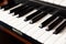 Simple pipe organ instrument keyboard closeup. Organ keys seen from up close, shallow depth of field. Sacral religious music