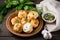 simple plate of warm, fluffy rolls and fresh herbs