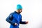 Simple portrait and white background, of a mountaineer man ready to start a challenge in nature