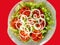 Simple salad. Typical Brazilian salad with tomato and onion lettuce