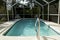 Simple screened in swimming pool in florida