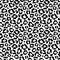 Simple seamless black and white pattern, imitates the skin of a leopard